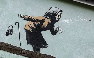 Кихаща жена на Банкси вдигна цена на къща
