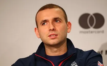 Британски тенисист порица Гришо