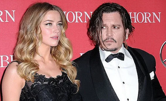 Амбър Хърд изгасила фас в лицето на Джони Деп