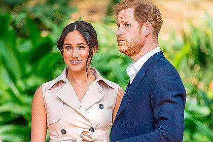 Хари и Меган мъкнат куфарите си