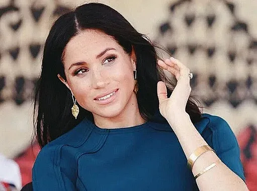 Меган пишела поканите на Долче и Габана