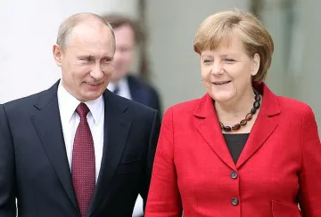 Путин поздрави Меркел за юбилея й на немски