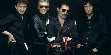 Членове на "Куин" по-богати от кралицата