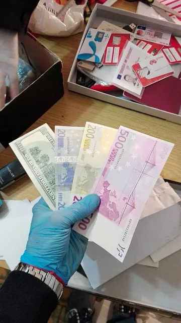 Разбиха схема за фалшиви документи и пари