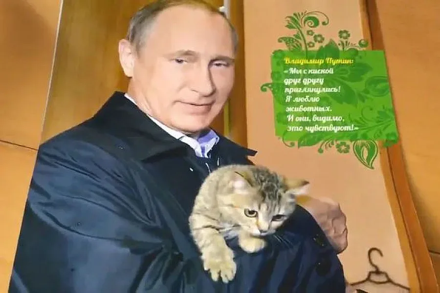 Путин с коте и на кон в календара за 2017 г.