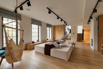 Направиха апартамент с пързалка и хамак