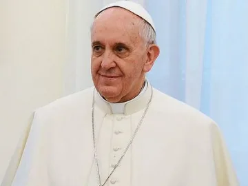 Папата пи чай и дъвка листа от кока