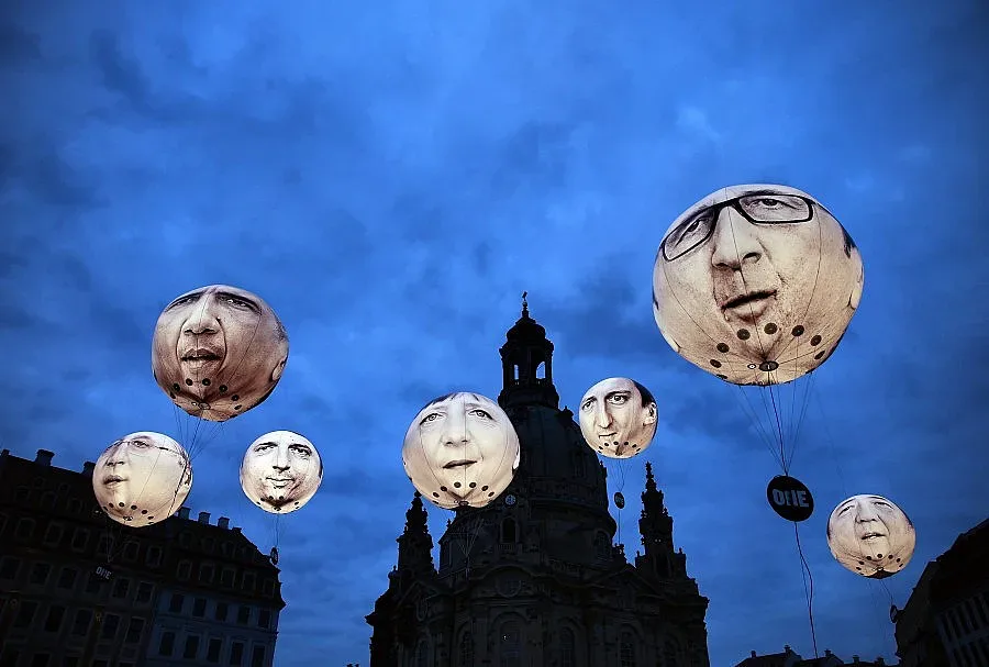 Путин, Меркел и Оланд спешно обсъдиха Донбас