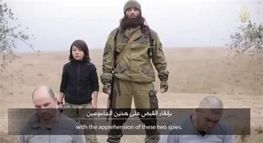 Дете ислямист екзекутира двама "руски агенти" (ВИДЕО)