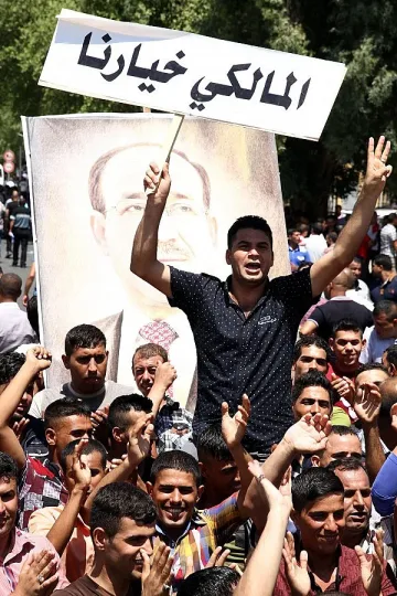 В Ирак премиер брани пост с танкове