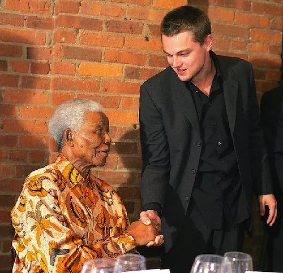 Лео се бори в съда за снимка с Мандела