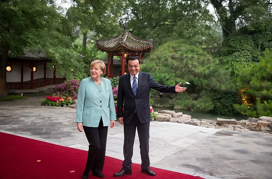 Меркел хваща тигана в Китай