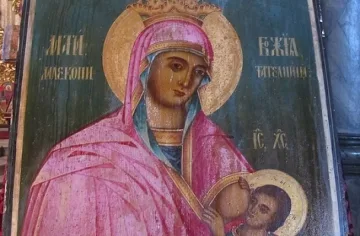 Българи и румънци пред кърмещата Мадона