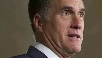 Мит Ромни имал акции на "Газпром"