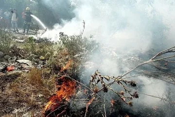 Гасят пожар над Рилския манастир