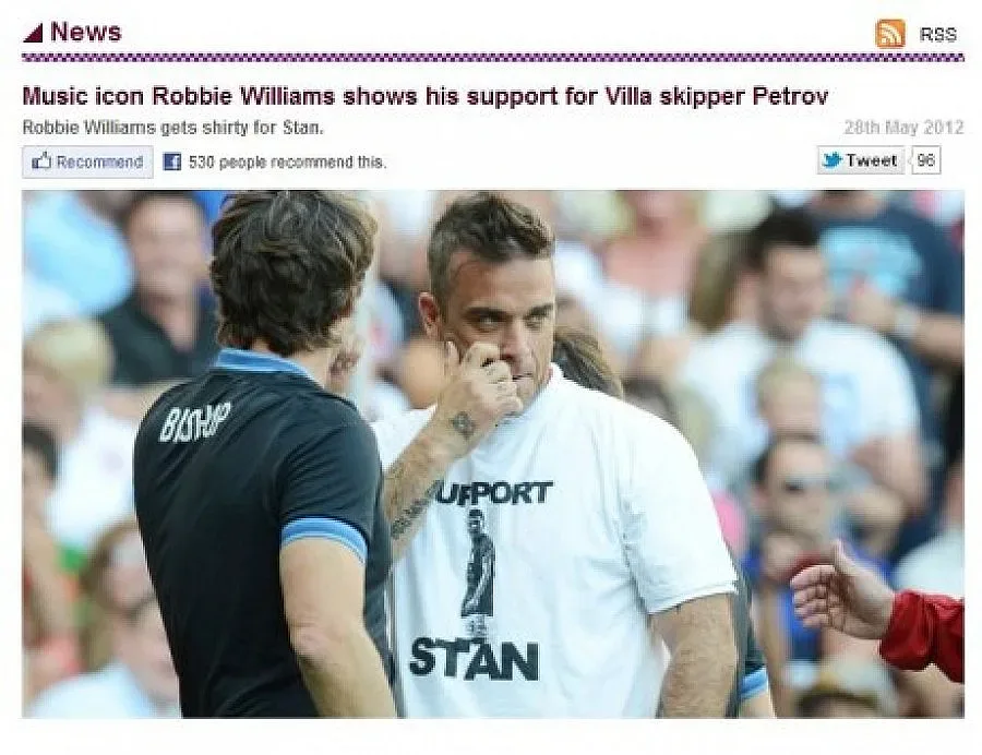 Роби Уилямс облече фланелка на Стилиян