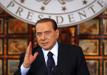 Кадафи молил Берлускони за помощ