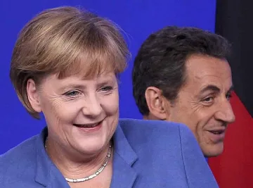 Меркел и Ромпой призоваха Италия да затегне икономиката си 