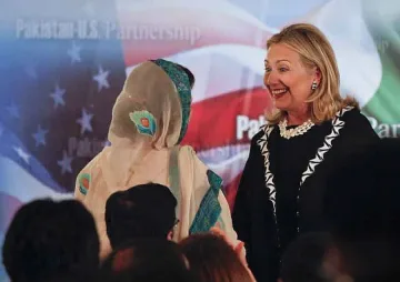 Хилари за Кадафи: "Уау!"