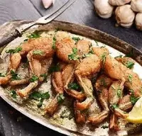 Най-вкусната рецепта за панирани жабешки бутчета с чесън и билки