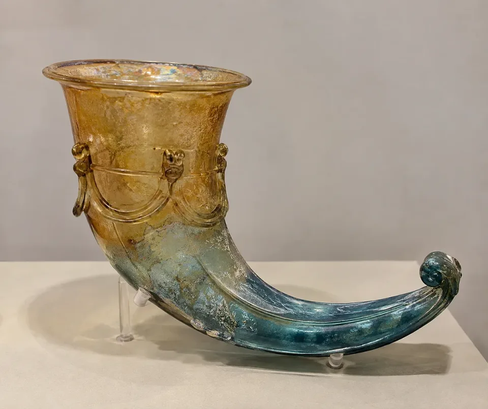 2 Third-century two-tone glass cornucopia